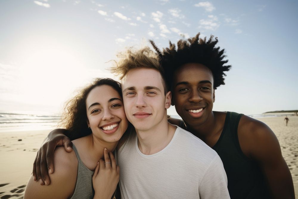 Happy multiracial friends leaning on each other beach laughing portrait. AI generated Image by rawpixel.