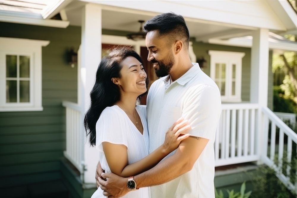 Husband and wife embracing in front of home portrait adult photo. AI generated Image by rawpixel.