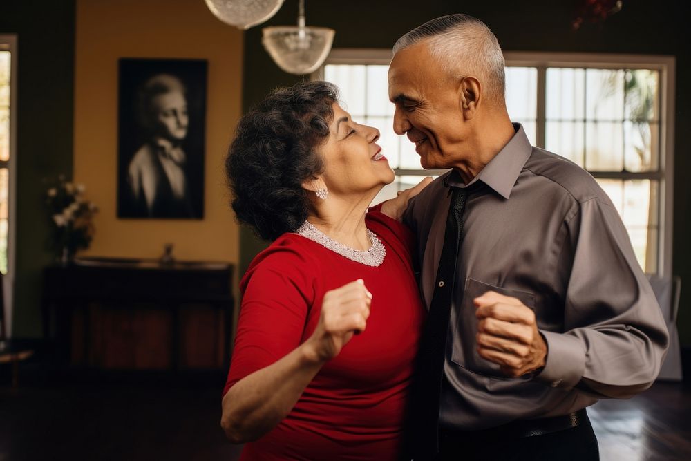 Latinx Elderly couple dancing adult entertainment affectionate. AI generated Image by rawpixel.