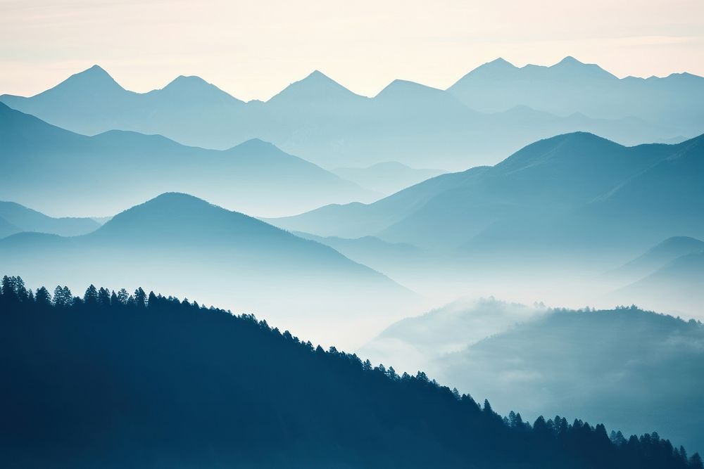 Misty mountain range colourful landscape panoramic outdoors. 