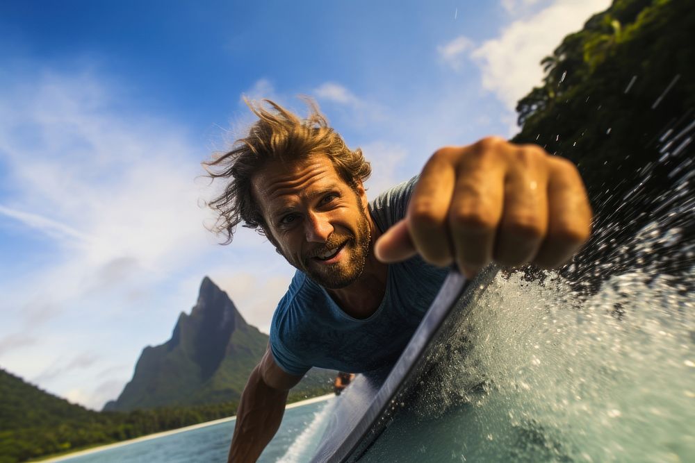 Muscular surfer rides in tropical paradise photography recreation outdoors. AI generated Image by rawpixel.