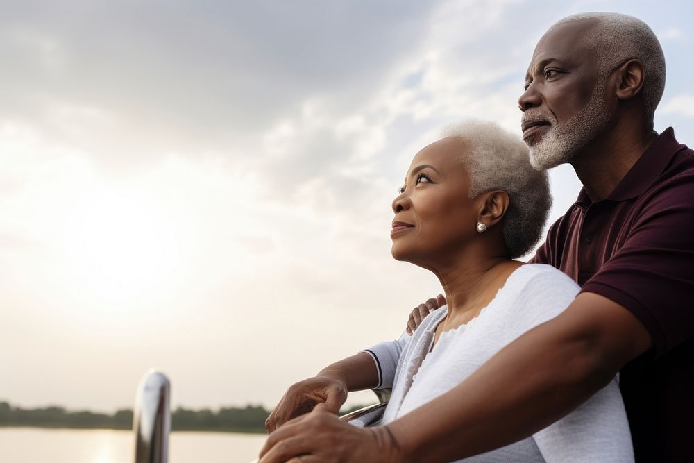 Senior black Couple Standing on Deck on a Boat Looking at the View portrait looking travel. AI generated Image by rawpixel.