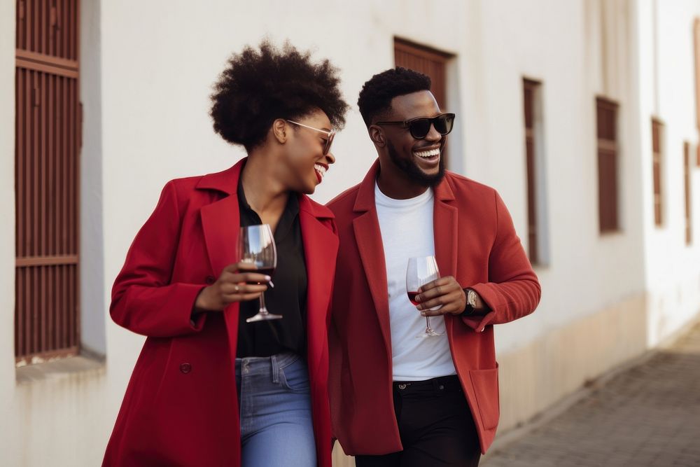 Smiling heterosexual black couple walking with red wine adult coat togetherness. AI generated Image by rawpixel.