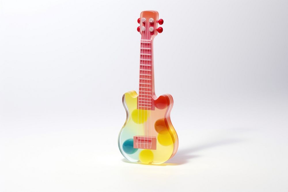 Mini guitar shape white background performance creativity. AI generated Image by rawpixel.