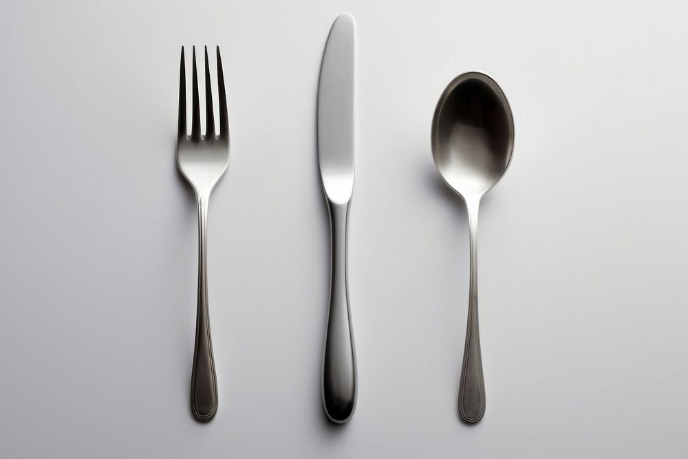 A spoon and fork knife silverware simplicity. AI generated Image by rawpixel.