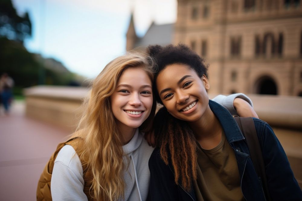 Two college students laughing portrait outdoors. AI generated Image by rawpixel.