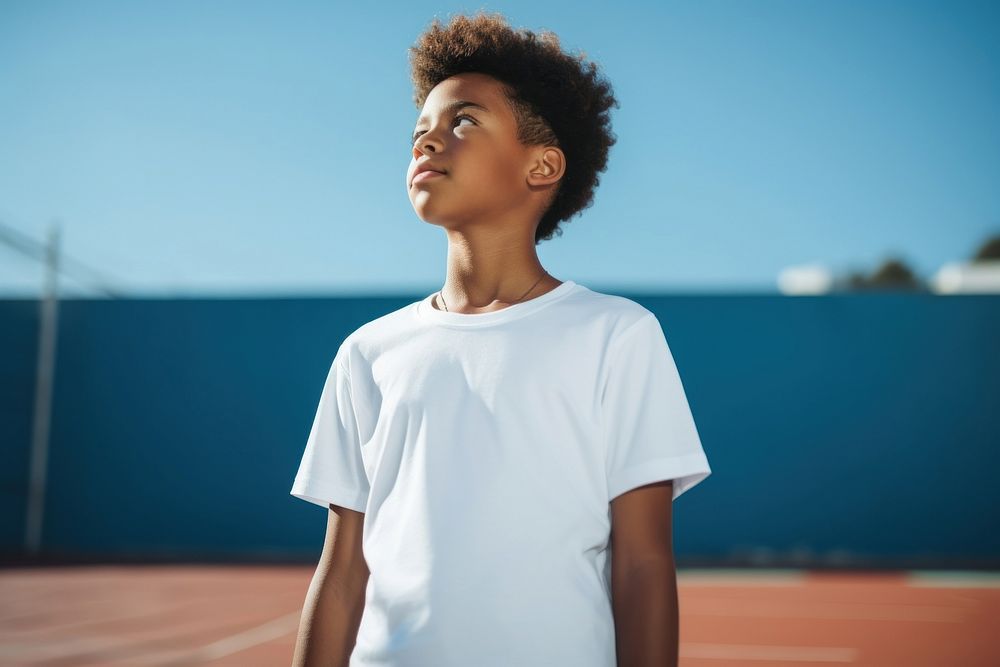 Mixed race kid t-shirt tennis white. AI generated Image by rawpixel.
