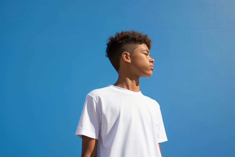 Mixed race kid t-shirt white blue. AI generated Image by rawpixel.