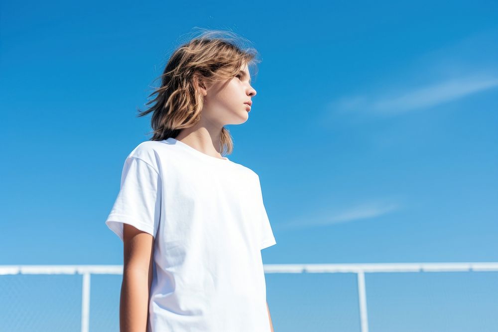Kid wearing white t-shirt sleeve blue contemplation. AI generated Image by rawpixel.