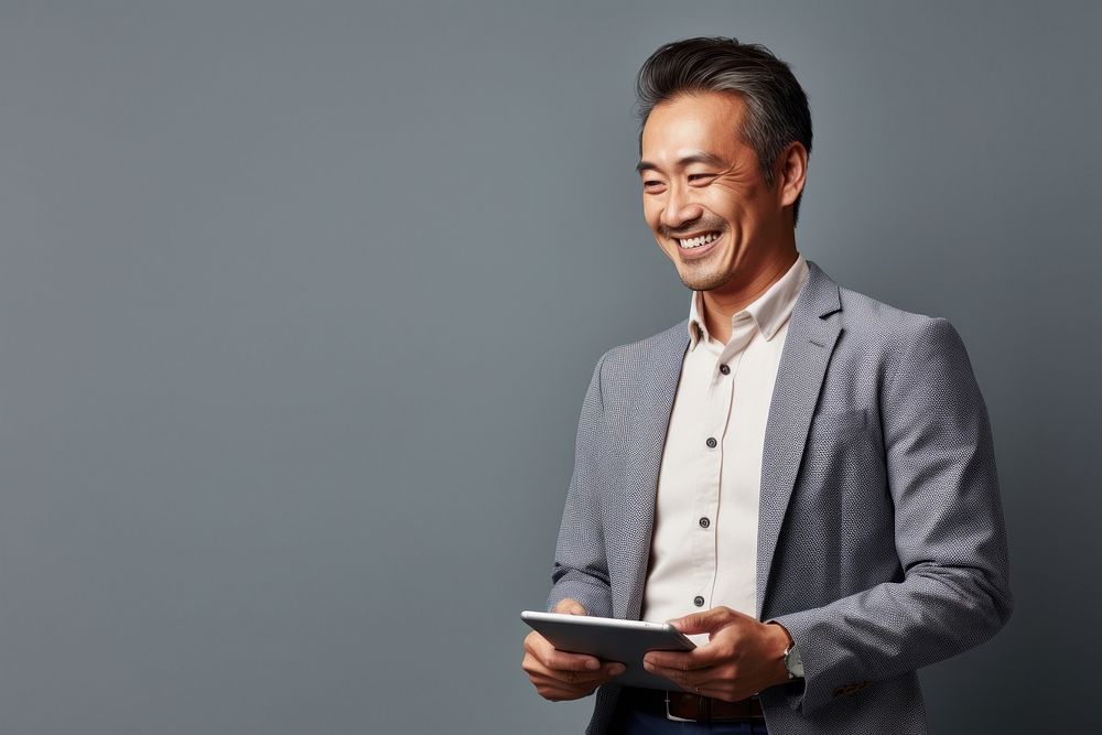 Mixed race asian businessman laughing smiling looking. AI generated Image by rawpixel.