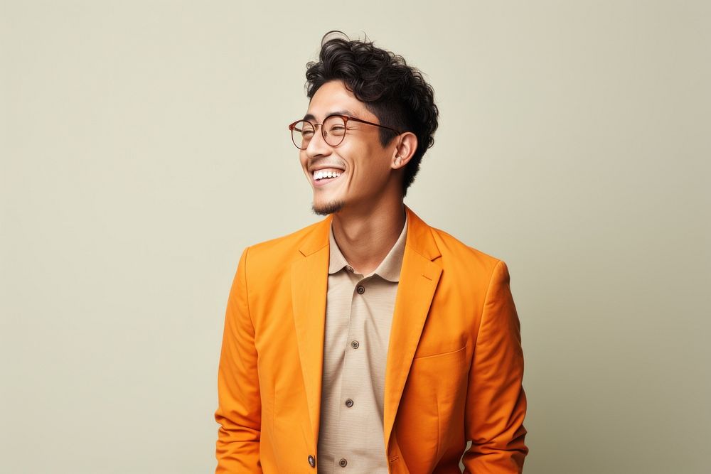 A mixed raced asian young man smile laughing portrait. AI generated Image by rawpixel.