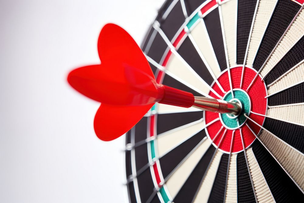 Dart hitting target darts game Premium Photo rawpixel