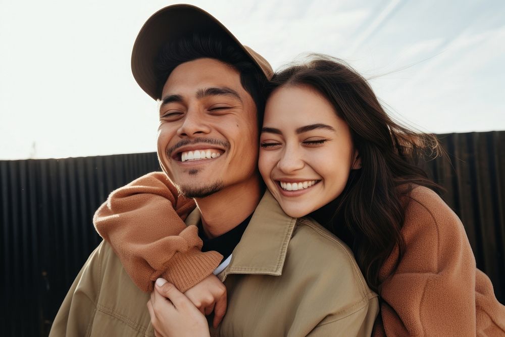 Latinx couple laughing portrait adult. AI generated Image by rawpixel.