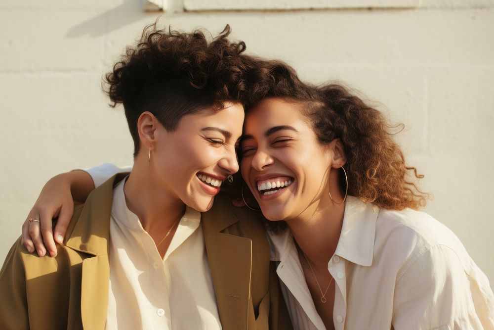 Latinx lesbian couple smile laughing adult. AI generated Image by rawpixel.