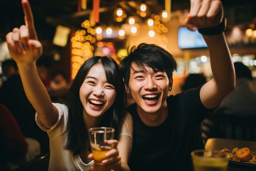 East asian couple party celebration laughing. AI generated Image by rawpixel.