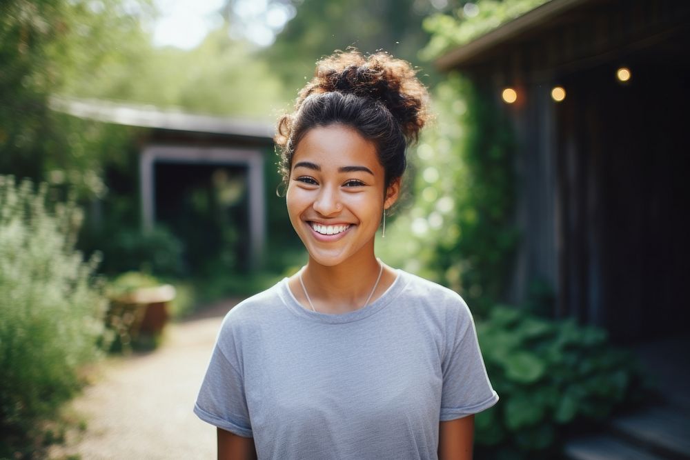 A girl with bun hair smile happy architecture. AI generated Image by rawpixel.