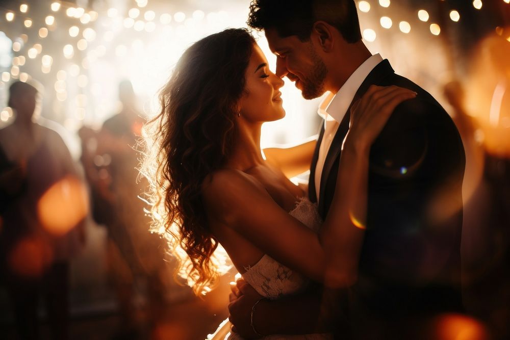 Latinx couple dancing in the party photography wedding kissing. AI generated Image by rawpixel.