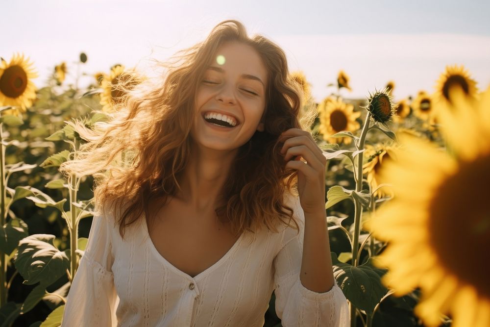 Girl sunflower laughing smiling. AI generated Image by rawpixel.