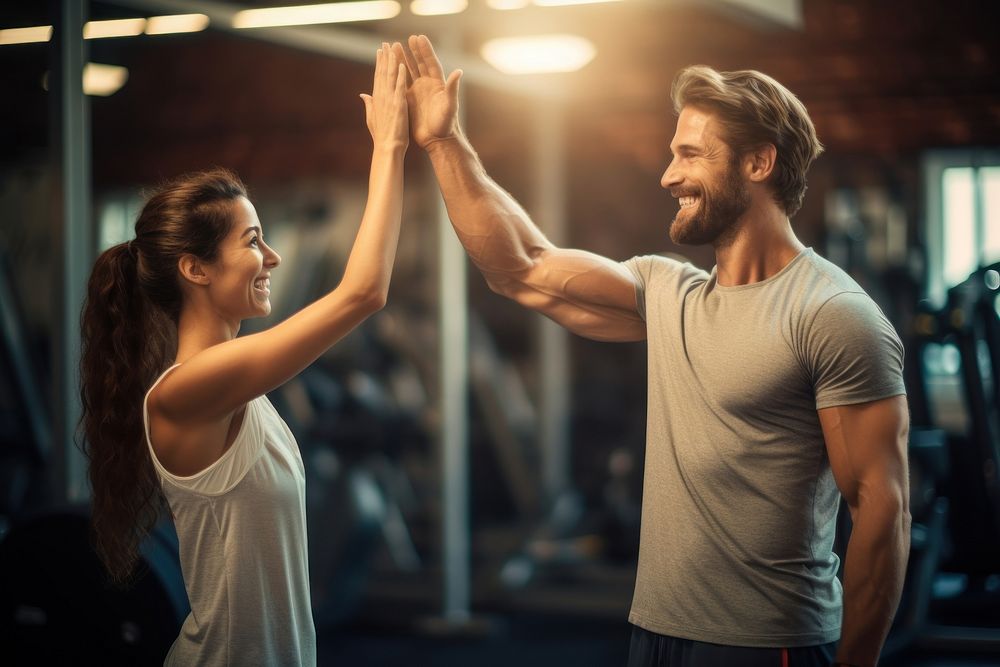 People giving hi-five adult gym determination. AI generated Image by rawpixel.