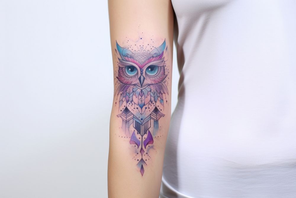 Owl tattoo skin arm. AI generated Image by rawpixel.