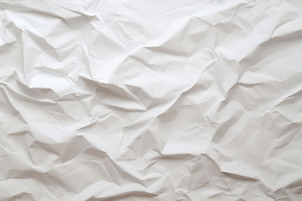 White crumpled paper texture white backgrounds full frame. AI generated Image by rawpixel.