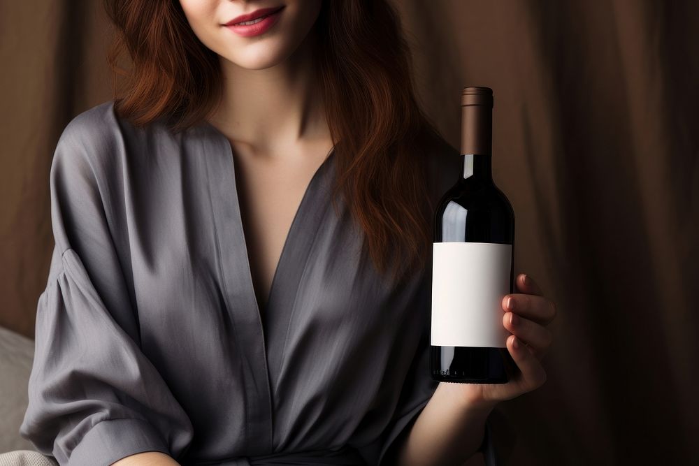 Wine bottle holding drink. AI generated Image by rawpixel.