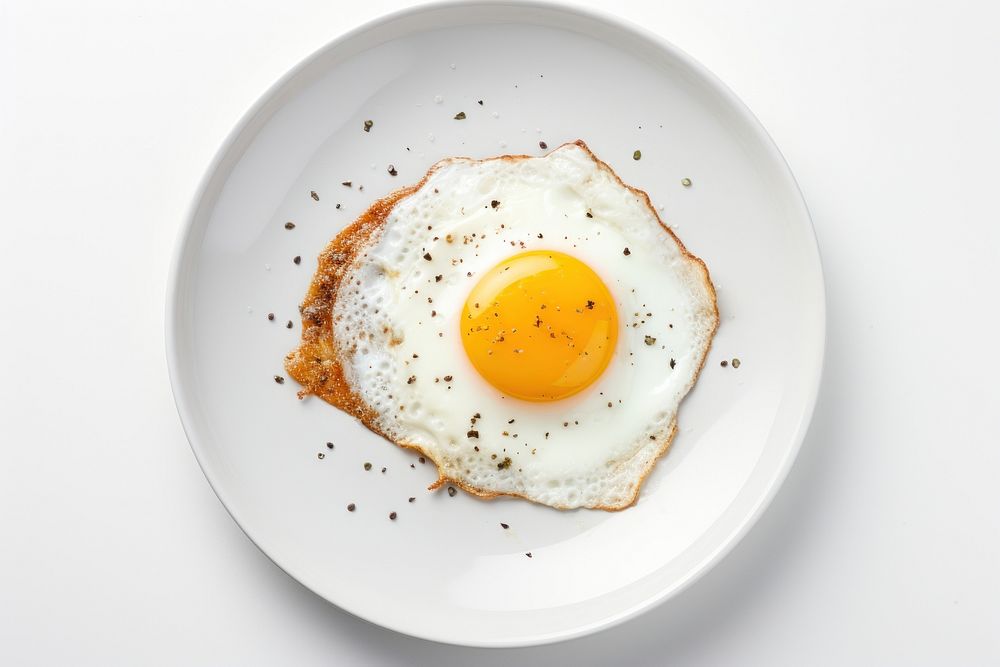 Fried egg plate food breakfast. AI generated Image by rawpixel.