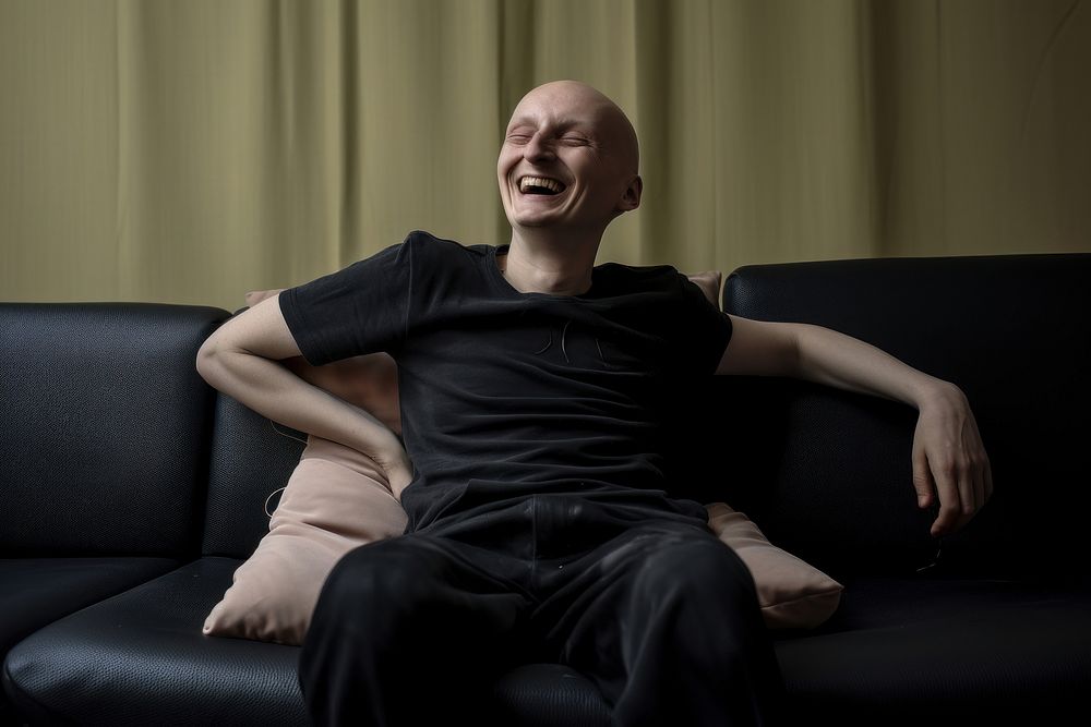 Cancer patient sitting furniture adult smile. AI generated Image by rawpixel.