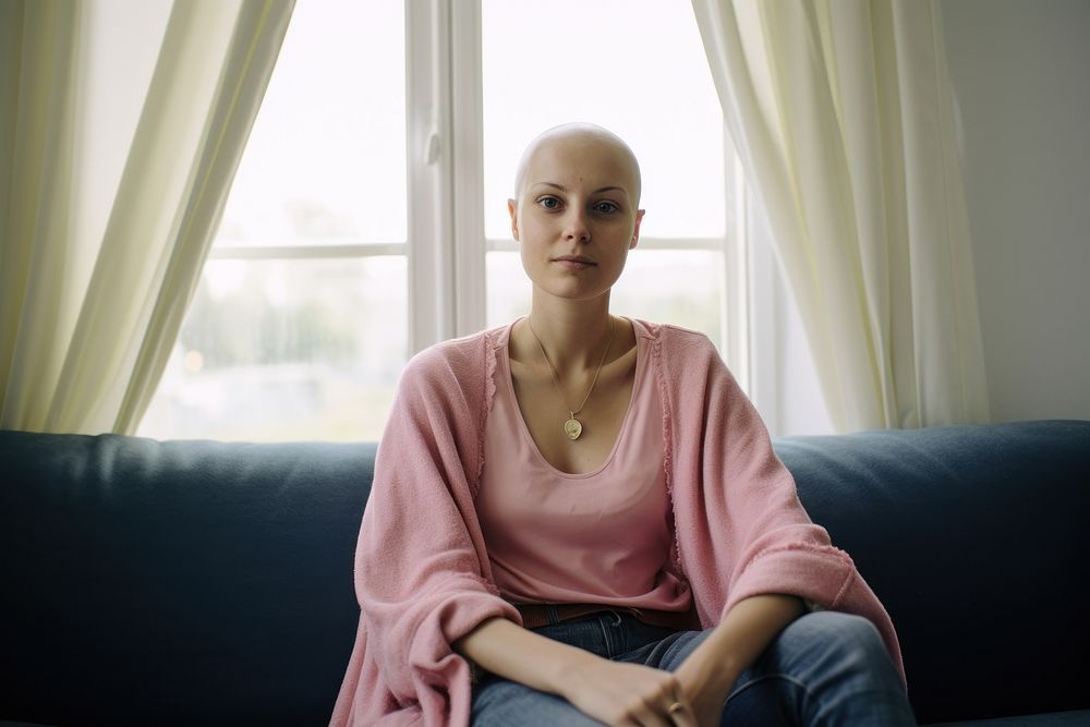 Cancer patient sitting looking adult sofa. AI generated Image by rawpixel.