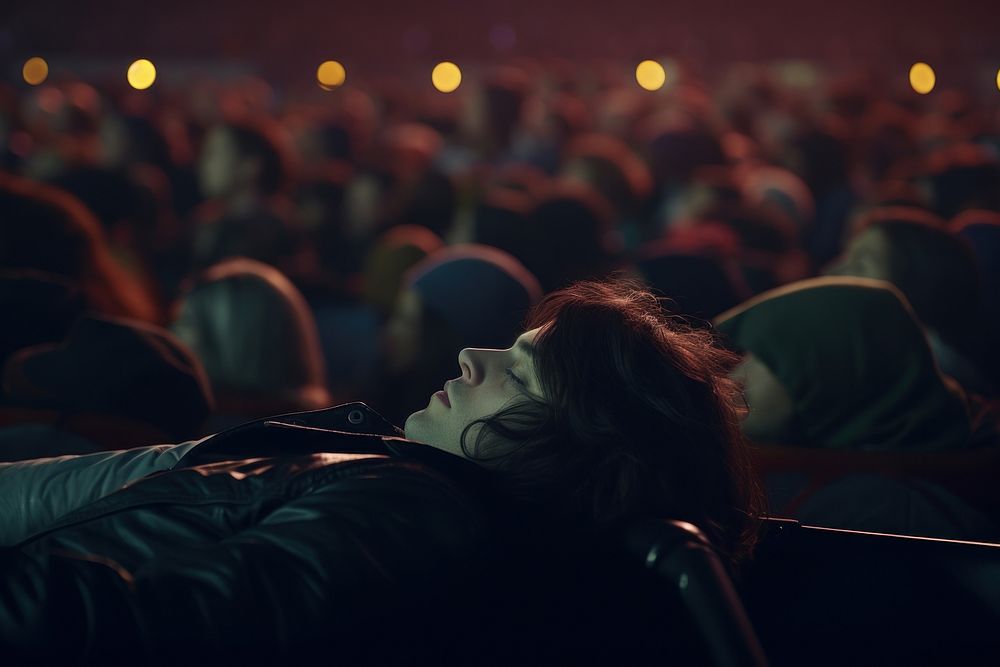 Male in crowd of fans feeling sleepy adult performance auditorium. AI generated Image by rawpixel.