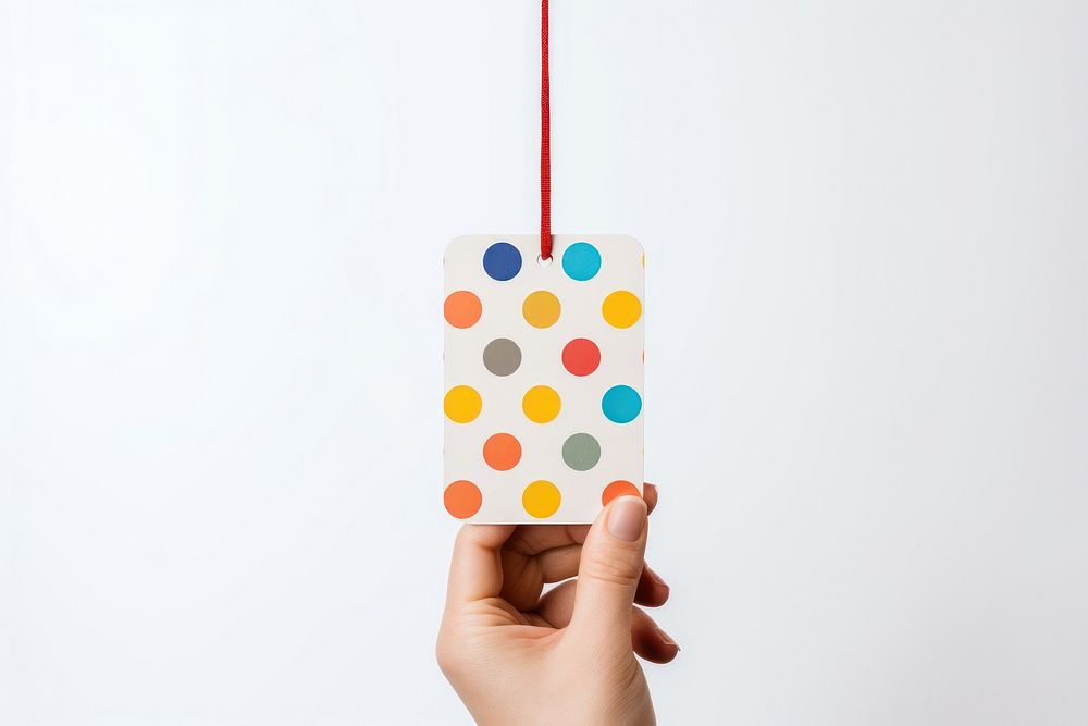 Price tag paper label circle shape pattern white background polka dot. AI generated Image by rawpixel.