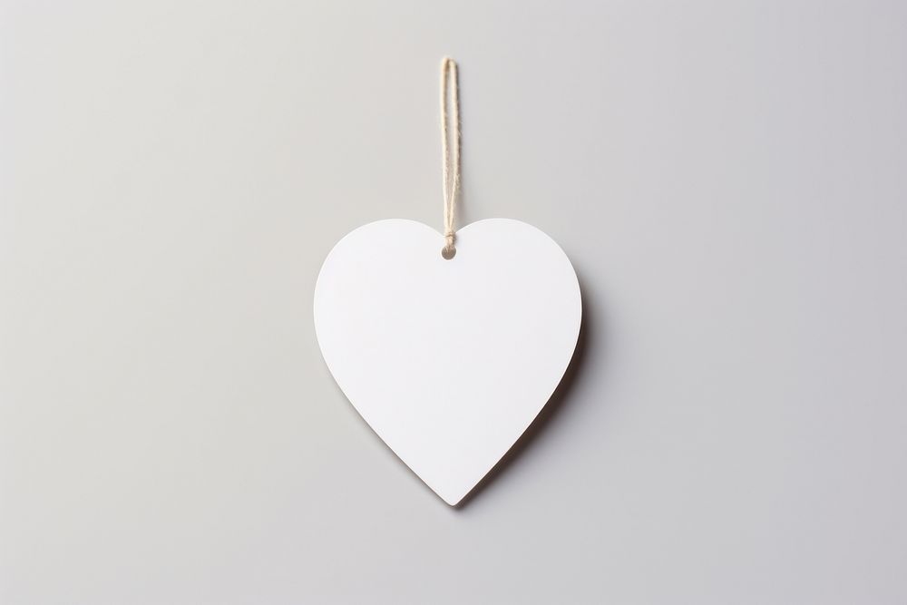 Price tag paper label heart shape pendant jewelry white. AI generated Image by rawpixel.