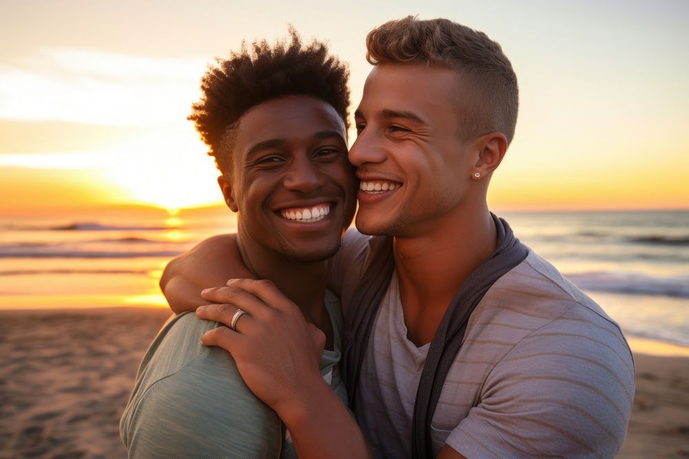 Black South African gay couple hugging smile beach laughing. AI generated Image by rawpixel.