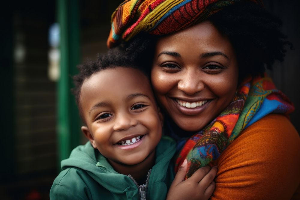 Black South African mom and son smile portrait hugging. AI generated Image by rawpixel.