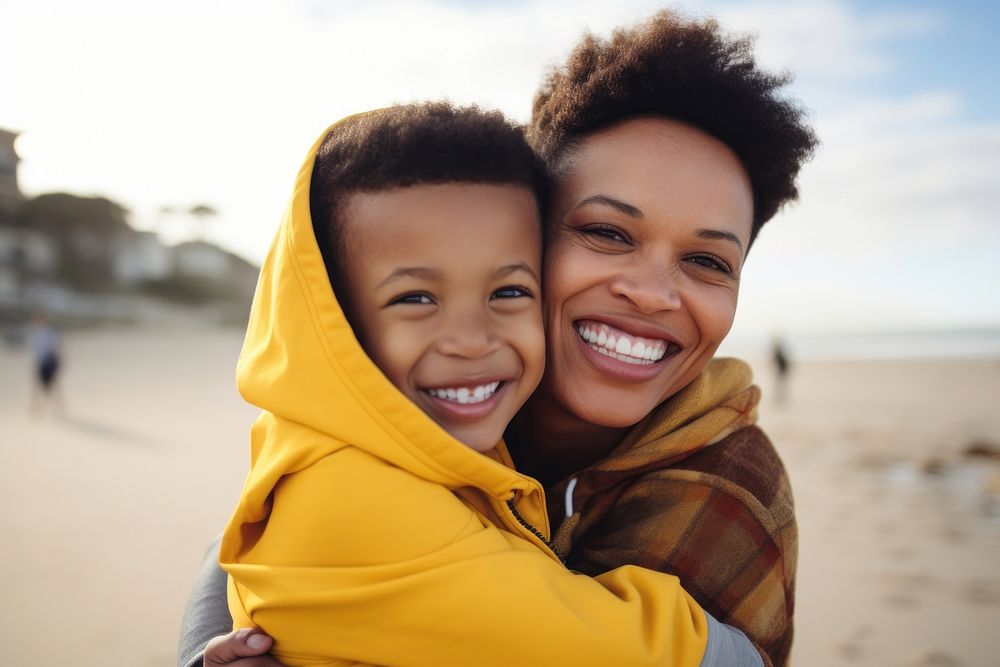 Black South African mom and son smile beach laughing. AI generated Image by rawpixel.