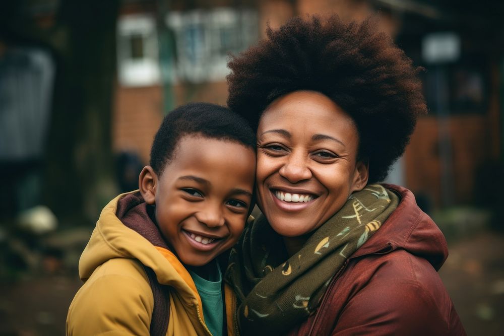Black South African mom and son smile laughing family. AI generated Image by rawpixel.