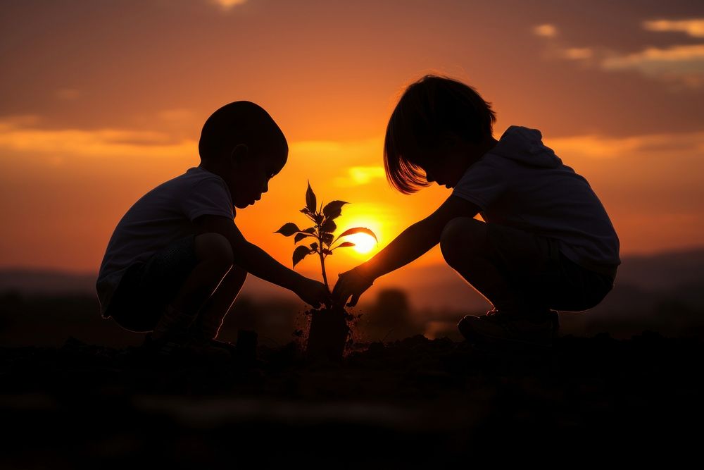 Boy and girl growing a plant backlighting silhouette outdoors. AI generated Image by rawpixel.