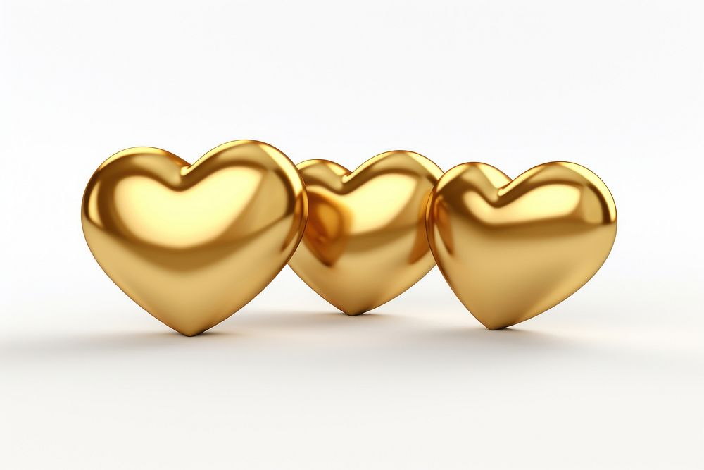 Three mini hearts gold white background jewelry. AI generated Image by rawpixel.