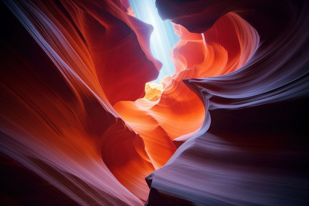 The spire of antelope slot canyon with the stars at night backgrounds illuminated sandstone. AI generated Image by rawpixel.
