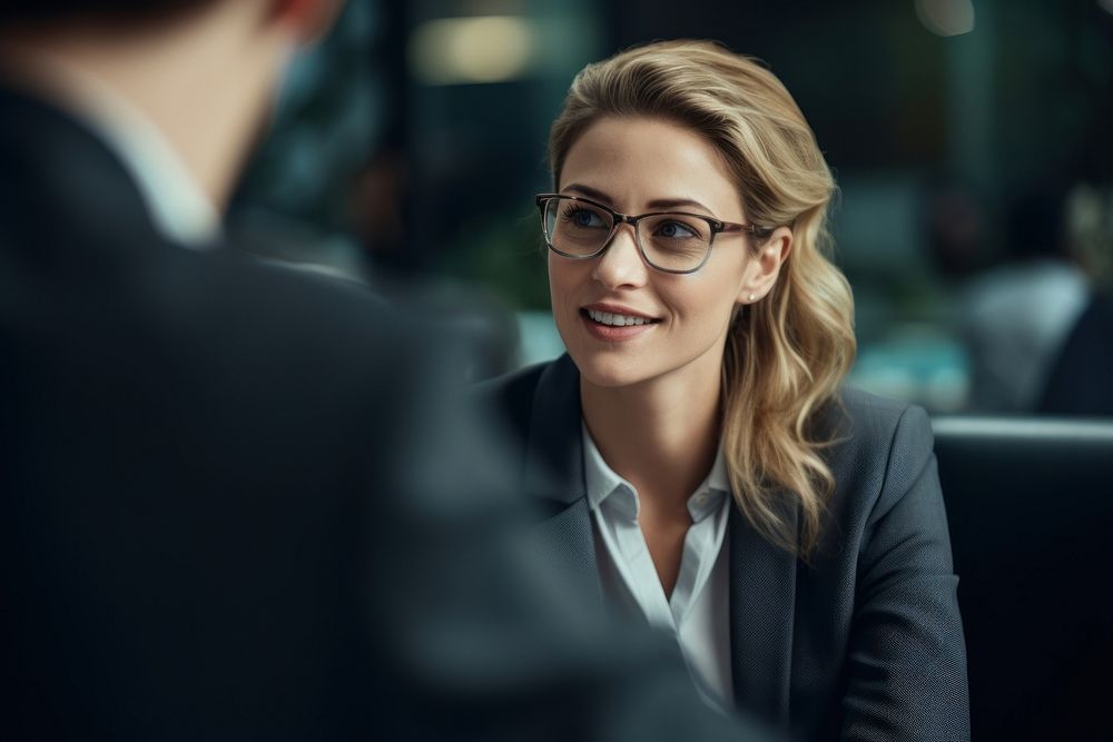 Businesswoman talking with client conversation glasses adult. AI generated Image by rawpixel.