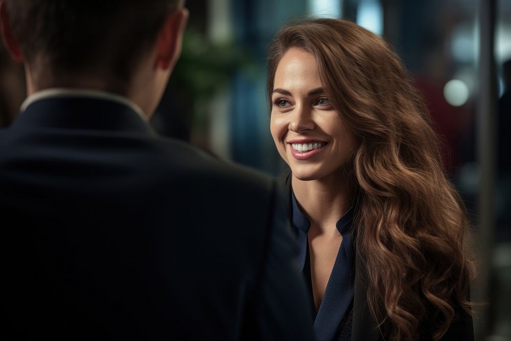 Businesswoman talking with client adult smile togetherness. AI generated Image by rawpixel.