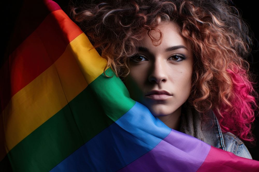 Lgbtq holding flag portrait photo photography. AI generated Image by rawpixel.