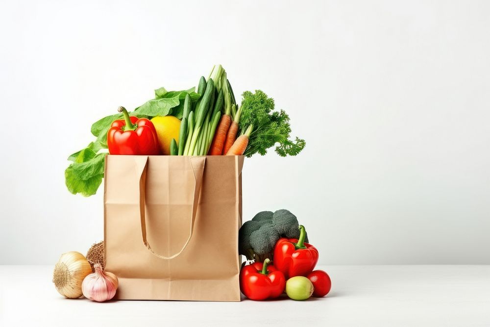 Paper bag vegetables food white background cauliflower. AI generated Image by rawpixel.