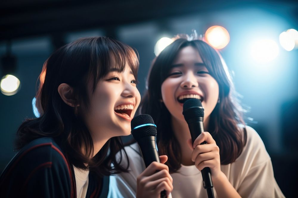 Japanese girl teenage friends karaoke microphone adult. AI generated Image by rawpixel.