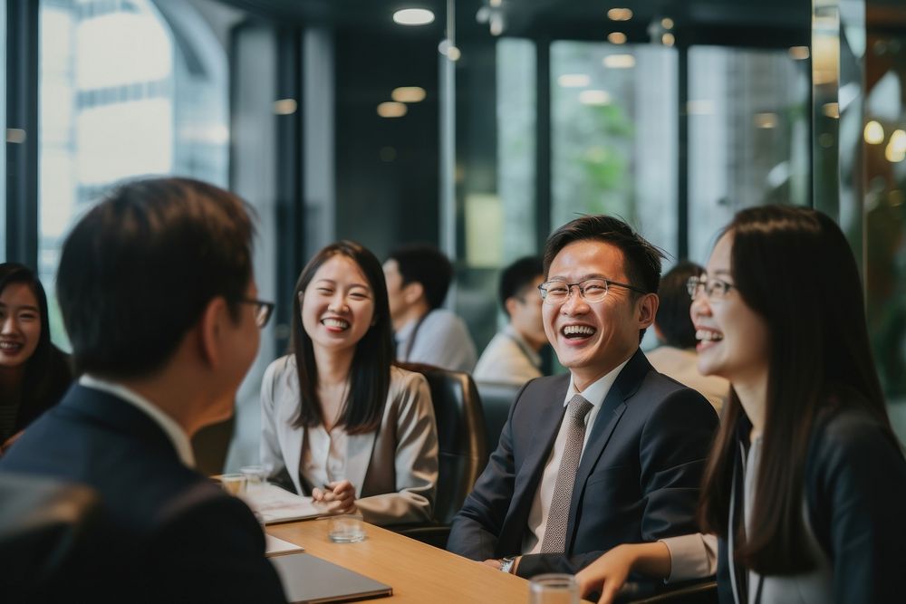 Hong Kong businesspeople laughing meeting adult. AI generated Image by rawpixel.