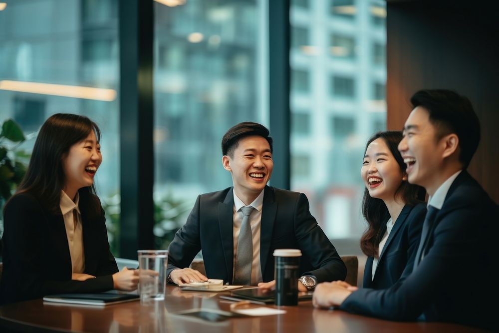 Professional Hong Kong businesspeople laughing meeting adult. 