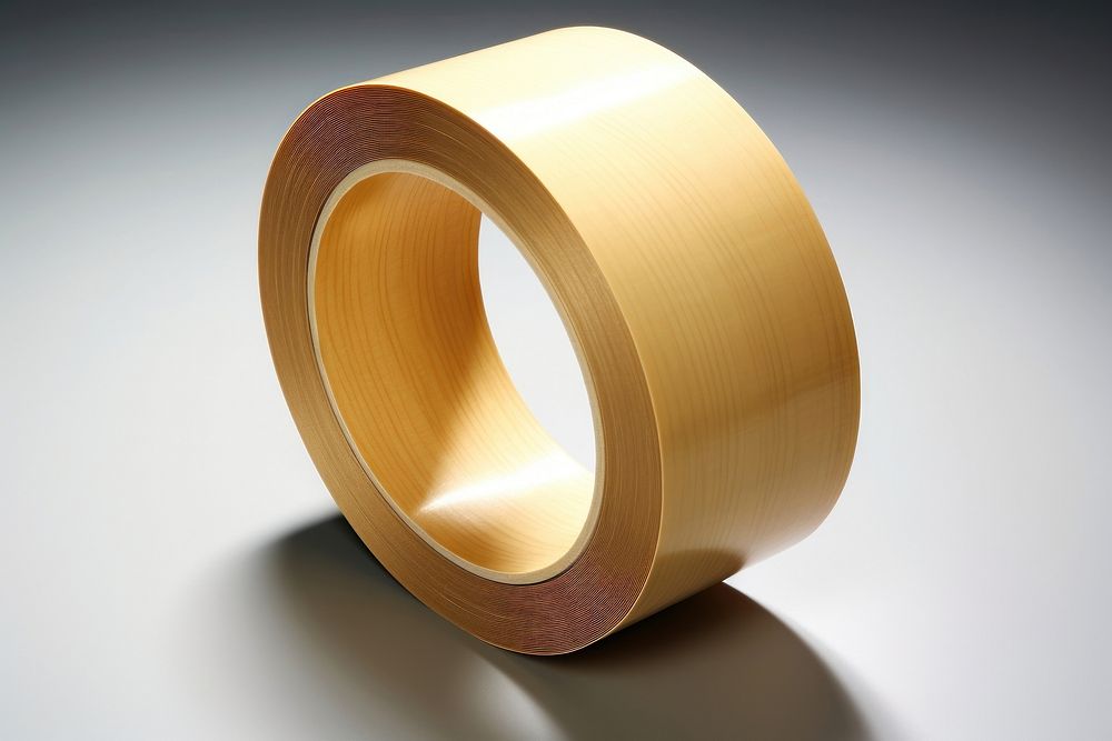 Duct tape gold cylinder circle. Free Photo rawpixel