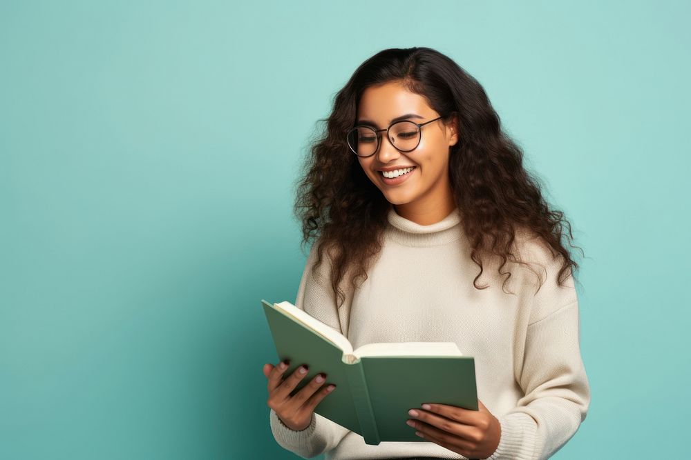 Female looking upward while reading glasses smile adult. 