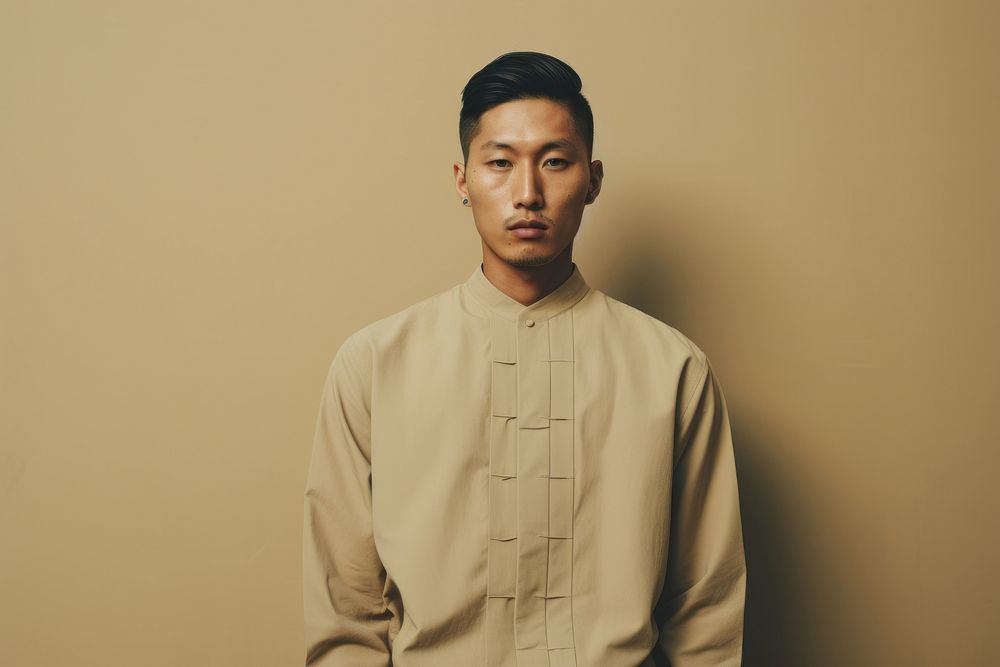Chinese man in minimalist clothing portrait fashion adult. AI generated Image by rawpixel.