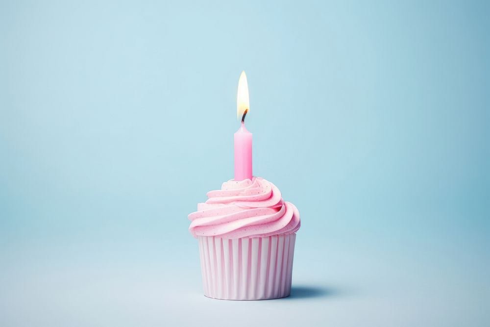 Birthday candle with cake cupcake dessert food. AI generated Image by rawpixel.
